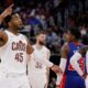 Cleveland Cavaliers guard Donovan Mitchell (45) celebrates as he walks off the court during the fourth quarter of Game 7 in a second-round NBA basketball playoffs series against the Detroit Pistons, Sunday, May 17, 2026, in Detroit. (AP Photo/Duane Burleson)