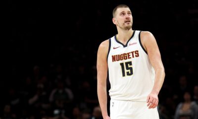 Denver Nuggets center Nikola Jokic (15) looks on during the second half of Game 6 of a first-round NBA basketball playoffs series against the Minnesota Timberwolves, Thursday, April 30, 2026, in Minneapolis. (AP Photo/Matt Krohn)