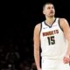 Denver Nuggets center Nikola Jokic (15) looks on during the second half of Game 6 of a first-round NBA basketball playoffs series against the Minnesota Timberwolves, Thursday, April 30, 2026, in Minneapolis. (AP Photo/Matt Krohn)
