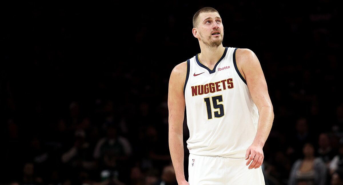 Denver Nuggets center Nikola Jokic (15) looks on during the second half of Game 6 of a first-round NBA basketball playoffs series against the Minnesota Timberwolves, Thursday, April 30, 2026, in Minneapolis. (AP Photo/Matt Krohn)